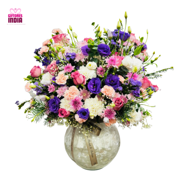 Beautiful Mixed Blossoms in Glass Vase Arrangement